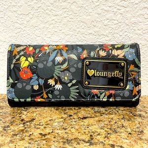 Loungefly skull and flowers faux leather wallet.